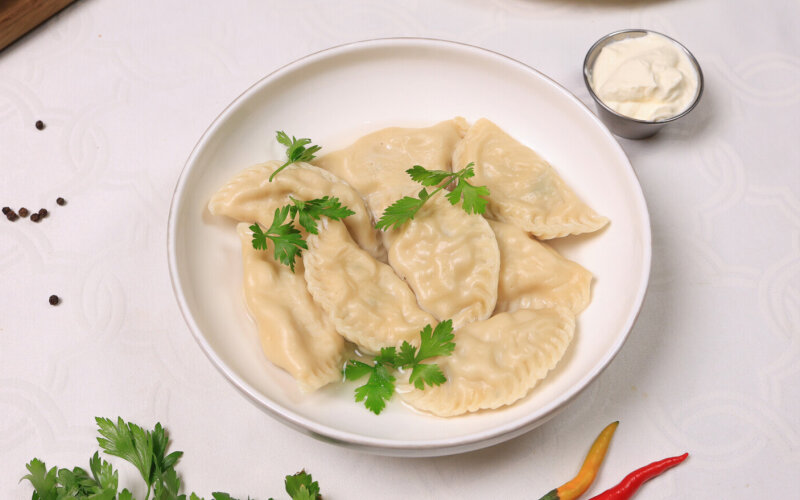 Пельмени из судака с бульоном